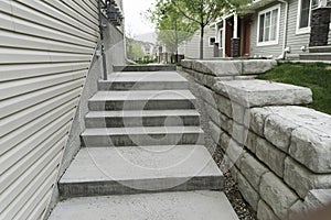 Walway in Apartment block with small retaining wall