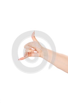 Waman`s hand shows a sign to make a phone call. Isolated
