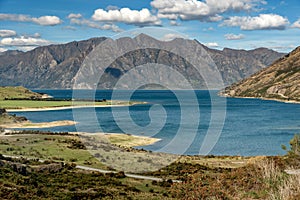 Wanaka lake with mountains in the background, New Zealand