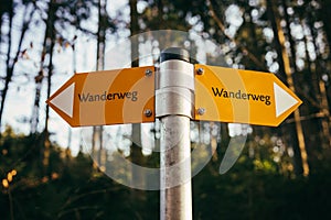 Wanderweg hiking trail sign in the nature