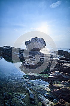 Wanli Fist Stone at Sunrise - Famous natural spot of Wanli District, New Taipei, Taiwan. photo