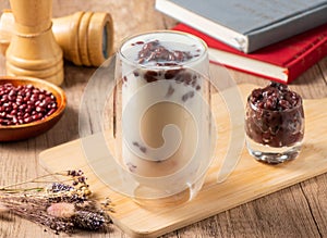 Wantan Red Bean Thick Soy Milk served in glass isolated on table top view of asian food photo
