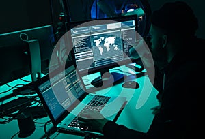 Wanted hackers coding virus ransomware using laptops and computers. Cyber attack, system breaking and malware concept.
