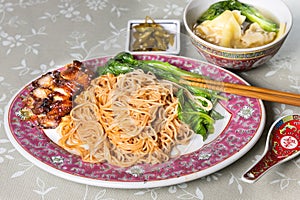 Wanton noodle with barbecue pork, vegetable and dumpling, popular Chinese food