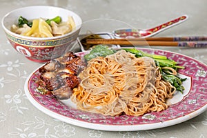 Wanton noodle with barbecue pork, vegetable and dumpling, popular Chinese food