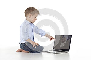 child indicates the laptop