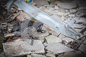 War, broken gas mask, Airport ruins in Donbass photo