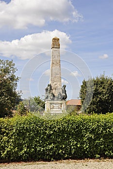 War Memorial Obelisk from the Medieval San Gimignano hilltop town. Tuscany region. Italy photo