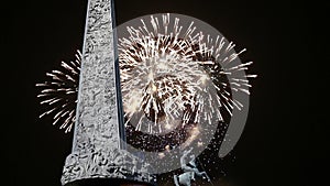 War memorial in Victory Park on Poklonnaya Hill and fireworks, Moscow, Russia.