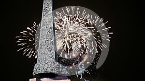 War memorial in Victory Park on Poklonnaya Hill and fireworks, Moscow, Russia.