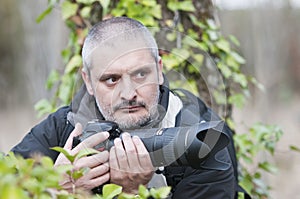 War photojournalist in a wild jungle.