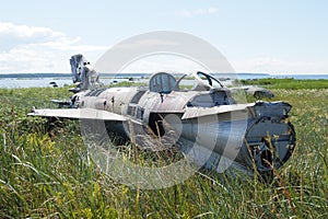 war plane crashed on shore of sea several years ago and lies on dunes