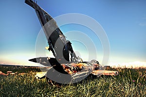 war plane crashed on shore of sea several years ago and lies on dunes