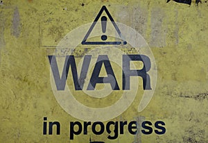 War in progress sign