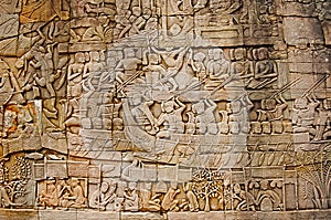 War scene carved on Bayon temple outer gallery. In the center of Angkor Thom , Siem Reap, Cambodia. UNESCO World Heritage Site.