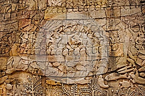 War scene carved on Bayon temple outer gallery. In the center of Angkor Thom , Siem Reap, Cambodia. UNESCO World Heritage Site.