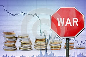 War sign on economy background - graph and coins. Economic crisis because of armed conflict