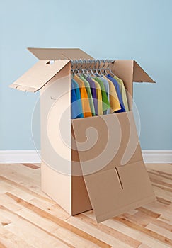 Wardrobe box with clothing, ready for moving