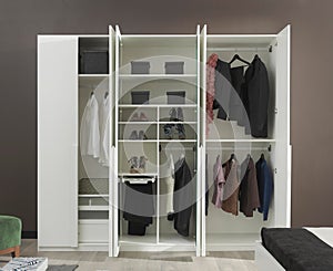 Wardrobe full of clothes