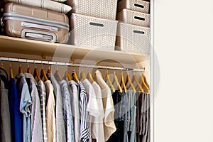 Wardrobe with perfect order clothes shades. Copy space photo