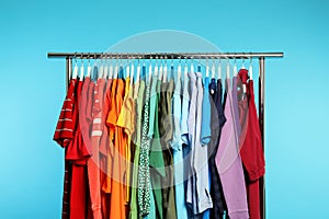 Wardrobe rack with different bright clothes