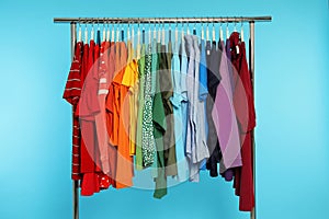 Wardrobe rack with different bright clothes