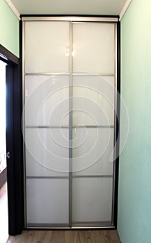 Wardrobe with sliding doors. Furniture.