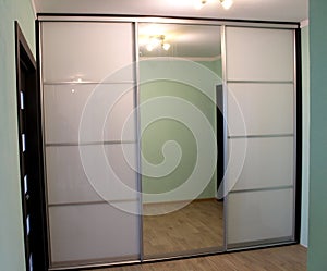 Wardrobe with sliding doors. Furniture.