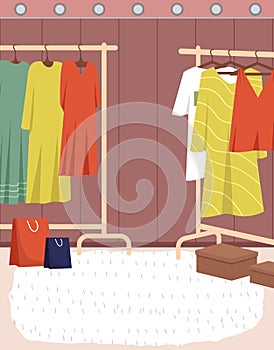 Wardrobe, womens clothing on stand in dressing room. Choosing clothes, garments for outfit concept