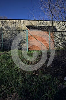 Warehouse behind a closed gate