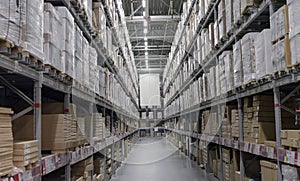 Warehouse with boxes on shelves and racks