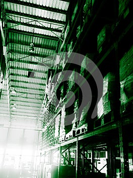 Warehouse cargo building store, warehouse interior with shelves, pallets and boxes for stock and sorting shipment goods in freight