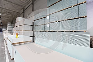 Warehouse with construction plasterboard photo