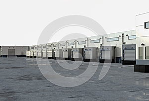 Warehouse exterior with shutter doors and truck parking lots