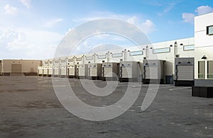 Warehouse exterior with shutter doors and truck parking lots