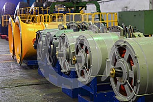 Warehouse of finished products in the industrial workshop of the plant for the production of large mining trucks.