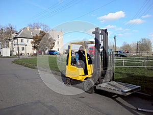 Warehouse forklift driver .