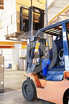 Warehouse forklift loader work