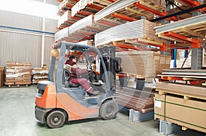 Warehouse forklift loader worker