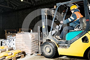 Warehouse forklift loader works