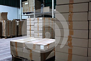 Warehouse interior. Storage of products in a warehouse. Products in cardboard boxes.