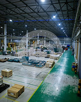 The warehouse for keeping material and finished goods of automotive parts for cars and tractors in Thailand. Manufacturing storage