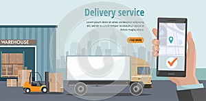 Warehouse Logistic and delivery service. Hand holding smartphone with mobile app for goods tracking and order.