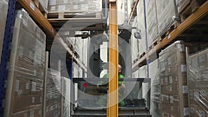 Warehouse man worker with forklift. loader lifting goods at shelves. concept logistics, elevator