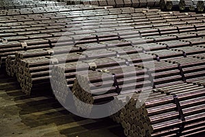 Warehouse of metal products. Round steel section rolling profile.