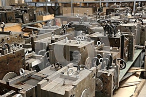 Warehouse metal workpieces and equipment obsolete mechanical plant unique individual production of electronic control devices, as