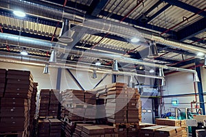 Warehouse with modern ventilation system full of raw material