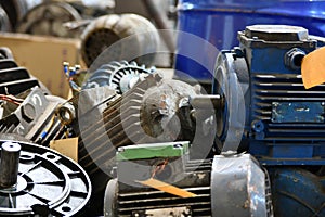 Warehouse for old broken and unused AC and AC motors in an electrical workshop