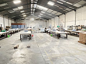 warehouse, plant and factory area and interior with machinery, inventories, shelves, pallets and boxes