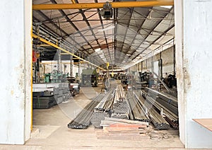 warehouse, plant and factory area and interior with machinery, inventories, shelves, pallets and boxes